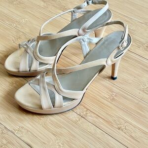 Elegant Stuart Weitzman Beige Patent Leather Strappy Heels